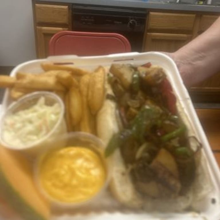 Indulge in Our Cheesesteak